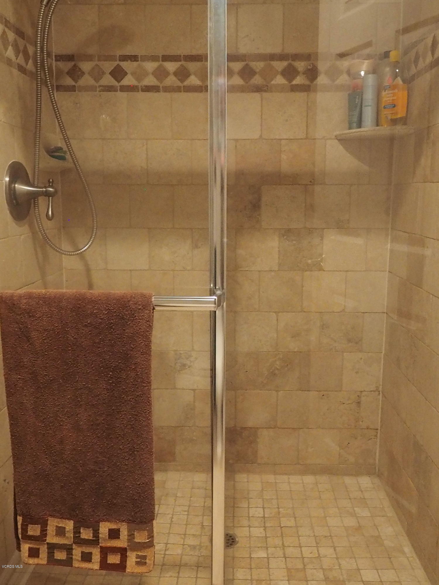 5727 Cochran Street Simi Valley, CA 93063 - Photo 22 of 43 a bathroom with a shower