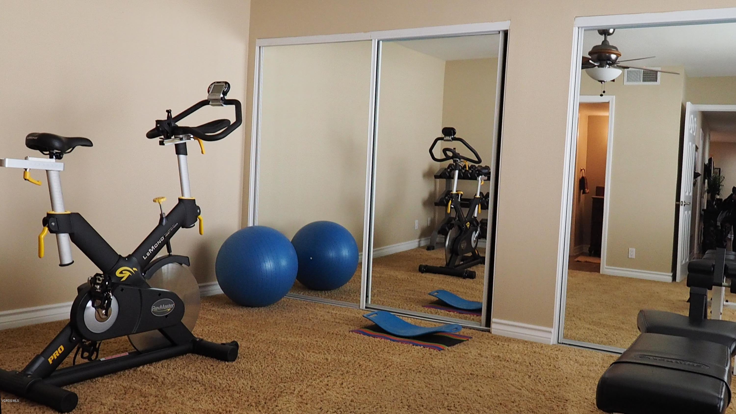 5727 Cochran Street Simi Valley, CA 93063 - Photo 24 of 43 a view of a room with gym equipment