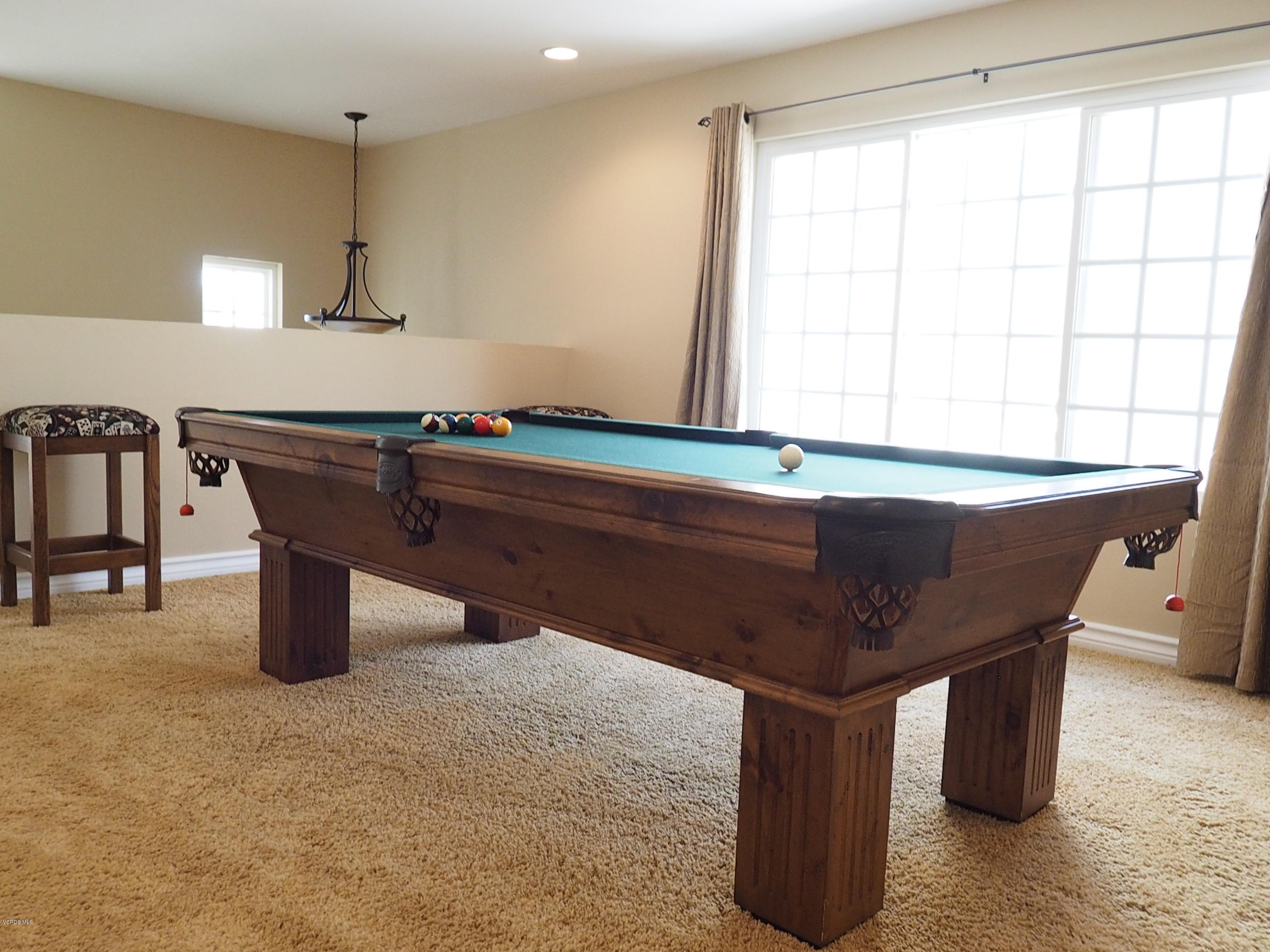 5727 Cochran Street Simi Valley, CA 93063 - Photo 27 of 43 a room with pool table and windows