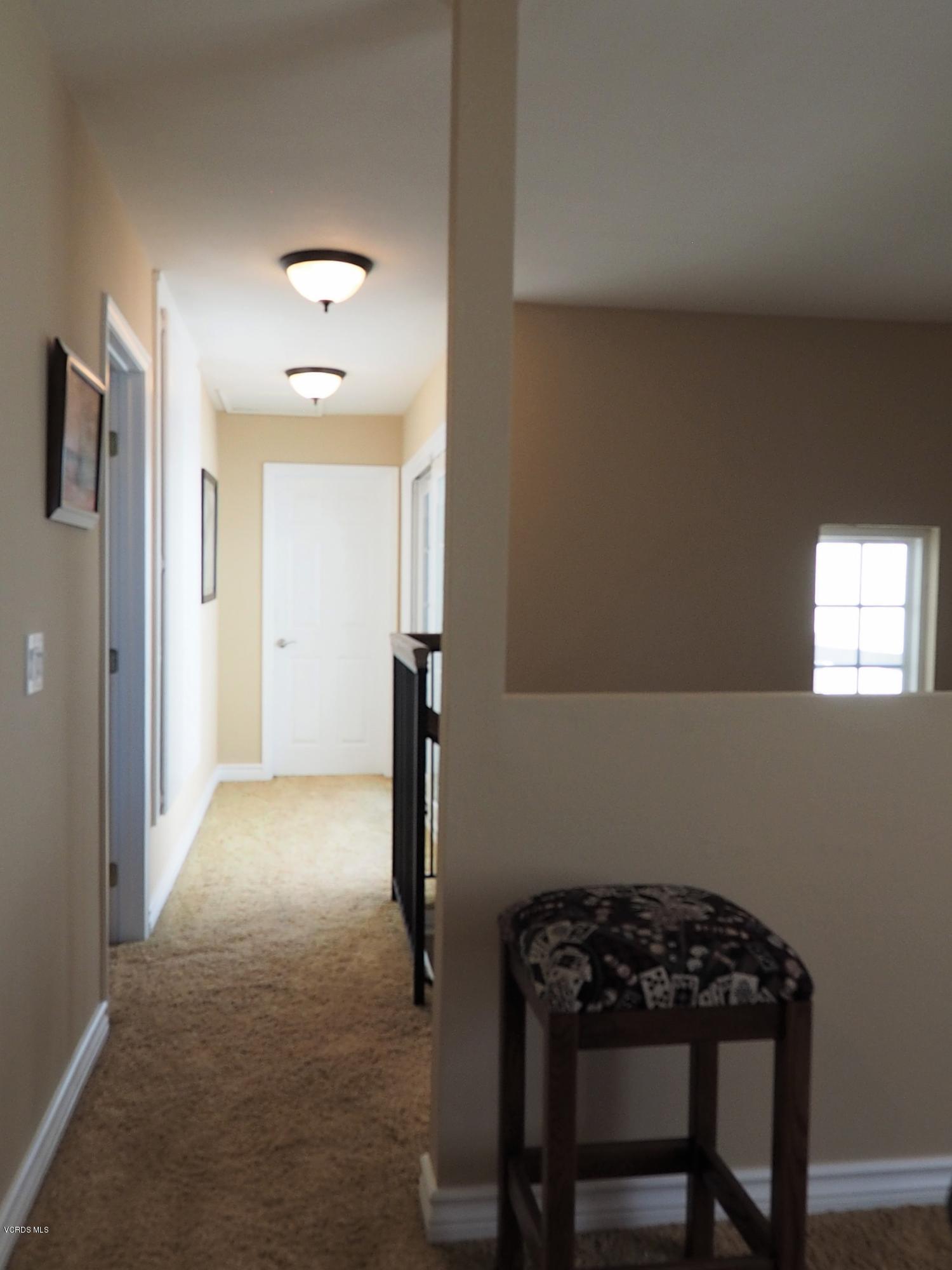 5727 Cochran Street Simi Valley, CA 93063 - Photo 30 of 43 a view of a room with a table and chairs