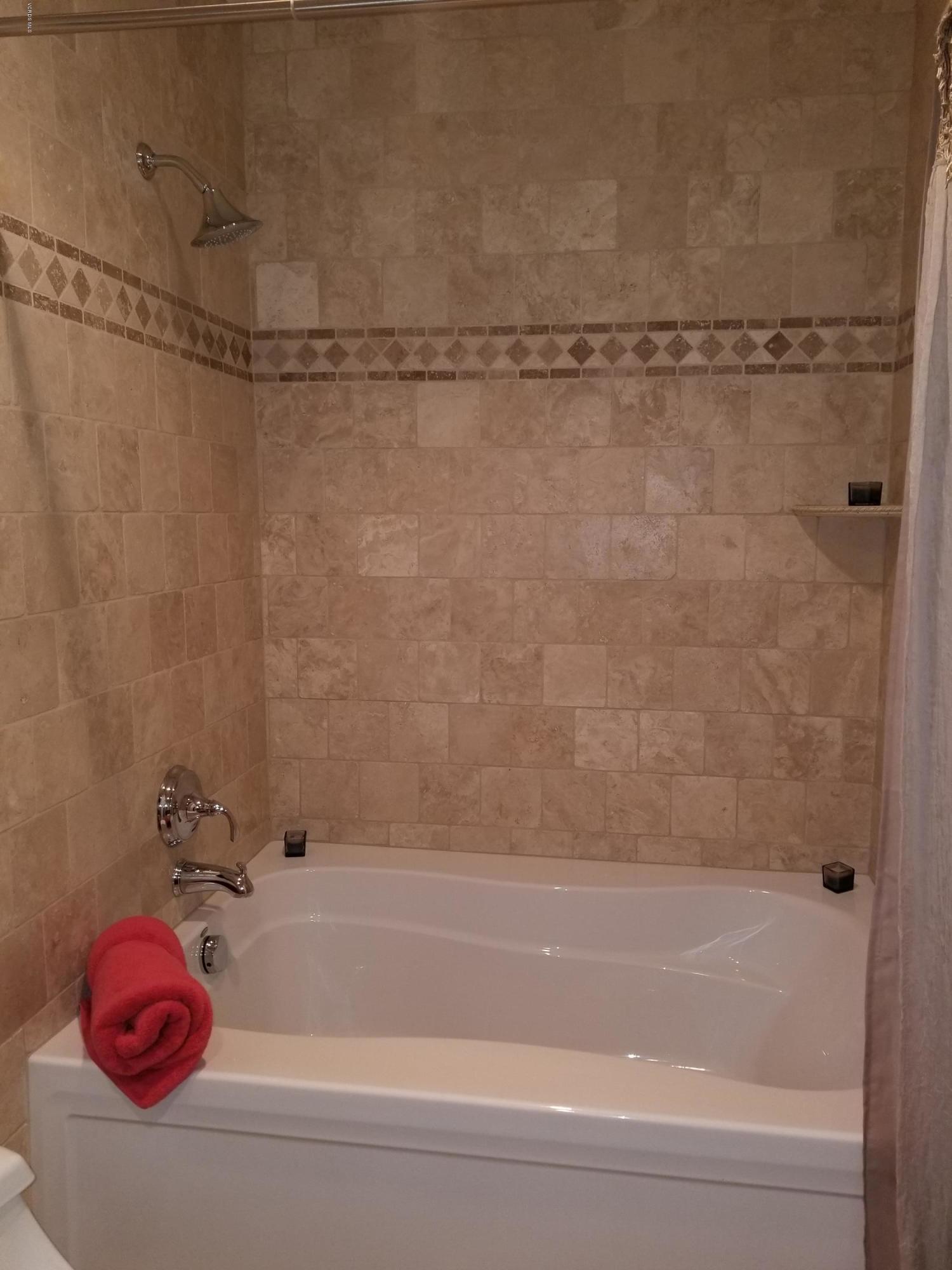 5727 Cochran Street Simi Valley, CA 93063 - Photo 37 of 43 a bathroom with a bathtub