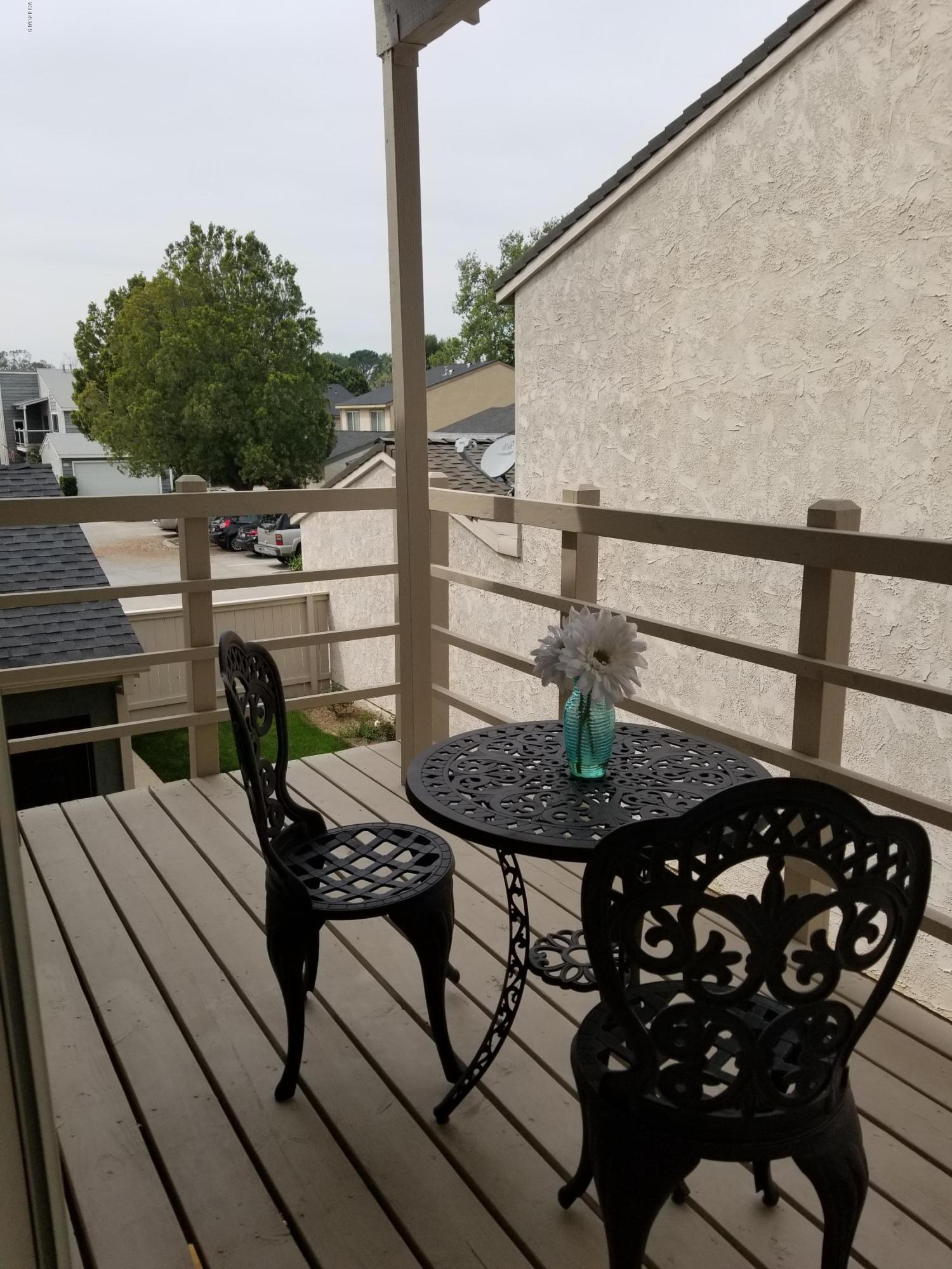 5727 Cochran Street Simi Valley, CA 93063 - Photo 39 of 43 a view of a balcony with chairs