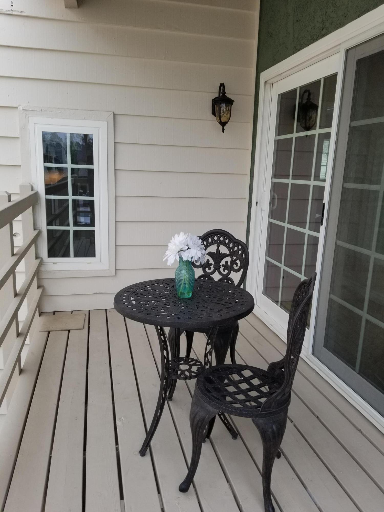5727 Cochran Street Simi Valley, CA 93063 - Photo 40 of 43 a view of balcony and wooden floor