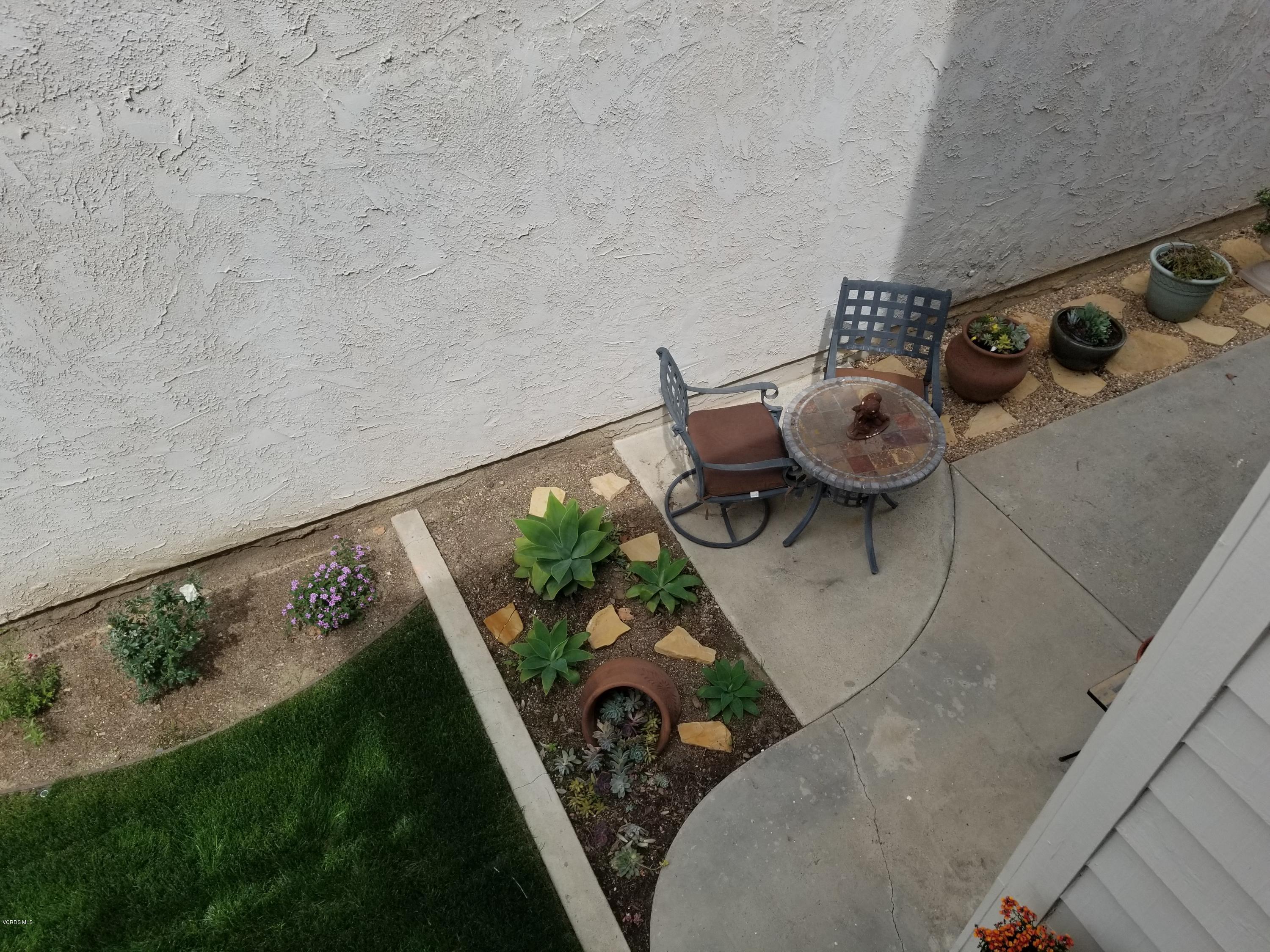5727 Cochran Street Simi Valley, CA 93063 - Photo 41 of 43 a view of dining table and chairs in the floor