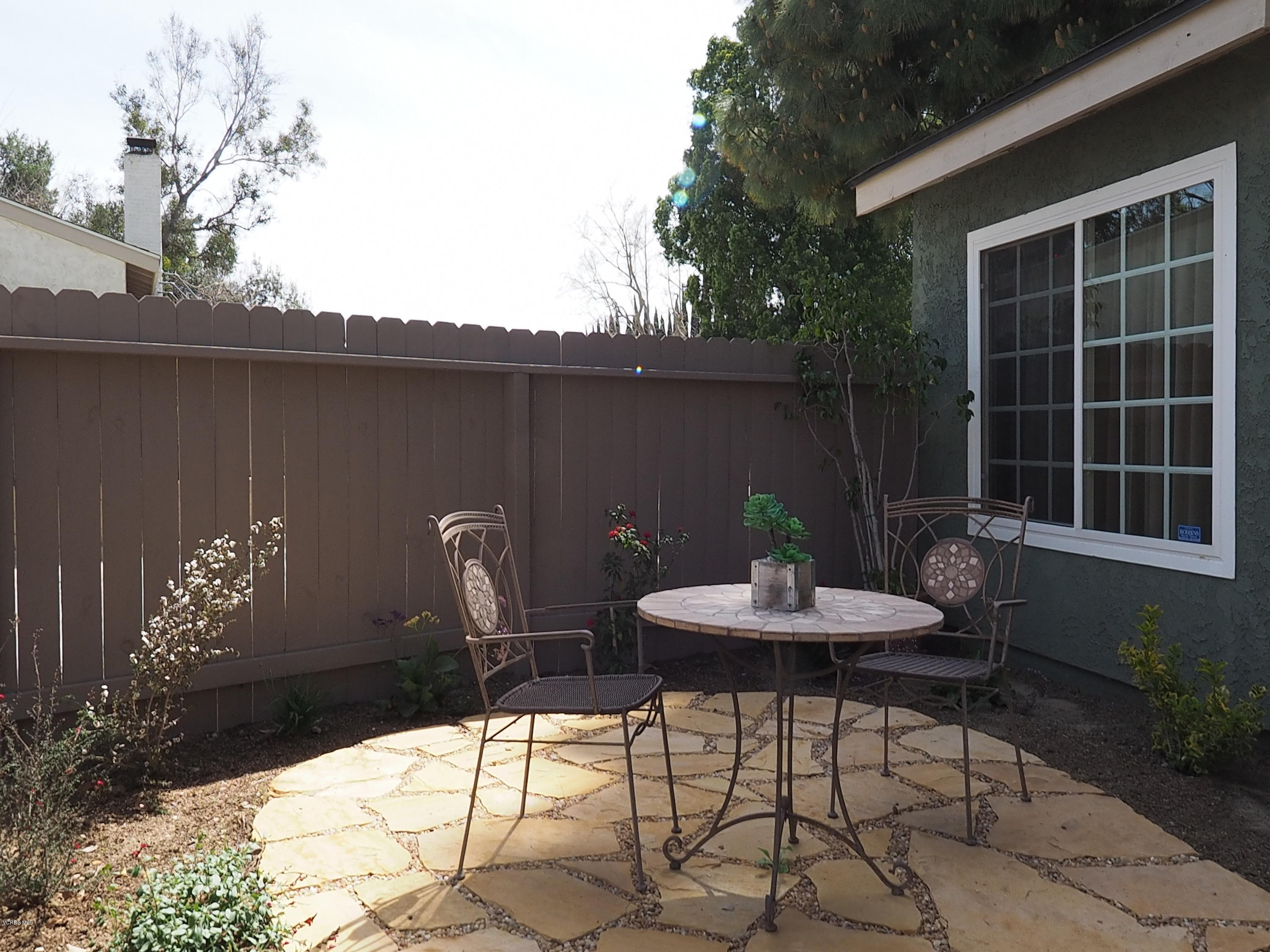 5727 Cochran Street Simi Valley, CA 93063 - Photo 7 of 43 a backyard of a house with table and chairs