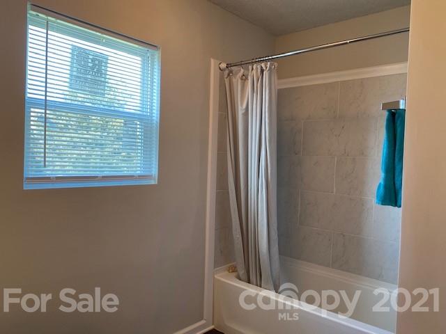 2346 Gill Jordan Road Chester, SC 29706 - Photo 19 of 30 a bathroom with a shower and a window