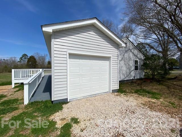 2346 Gill Jordan Road Chester, SC 29706 - Photo 28 of 30 a view of a house with a yard and garage