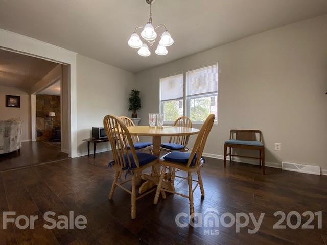 2346 Gill Jordan Road Chester, SC 29706 - Photo 8 of 30 a view of a dining room with furniture window and wooden floor