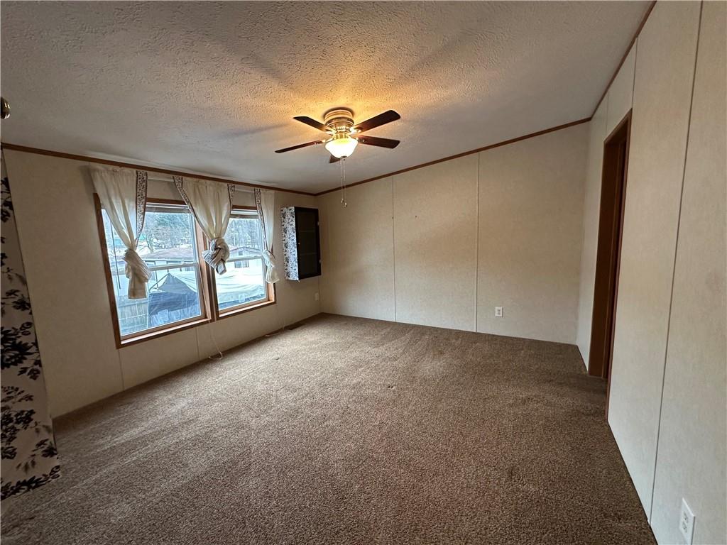 107 Trieste Street Butler, PA 16002 - Photo 19 of 40 a view of an empty room with a window
