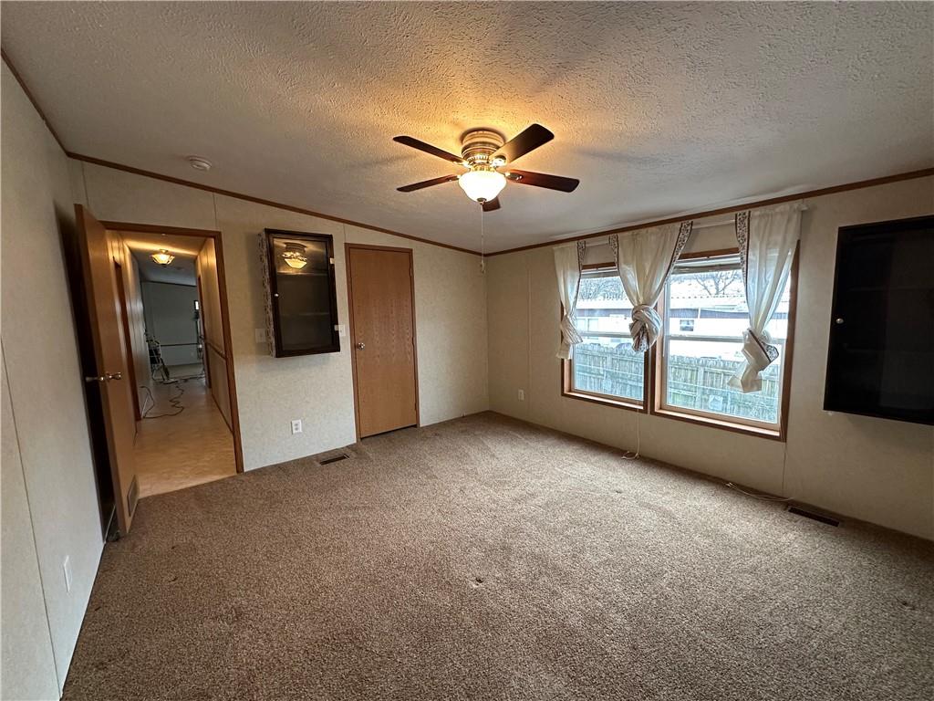 107 Trieste Street Butler, PA 16002 - Photo 20 of 40 a view of empty room with windows