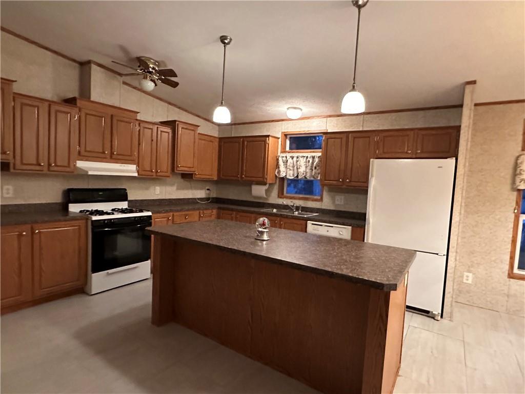 107 Trieste Street Butler, PA 16002 - Photo 2 of 40 a kitchen with stainless steel appliances granite countertop a sink a stove and a refrigerator