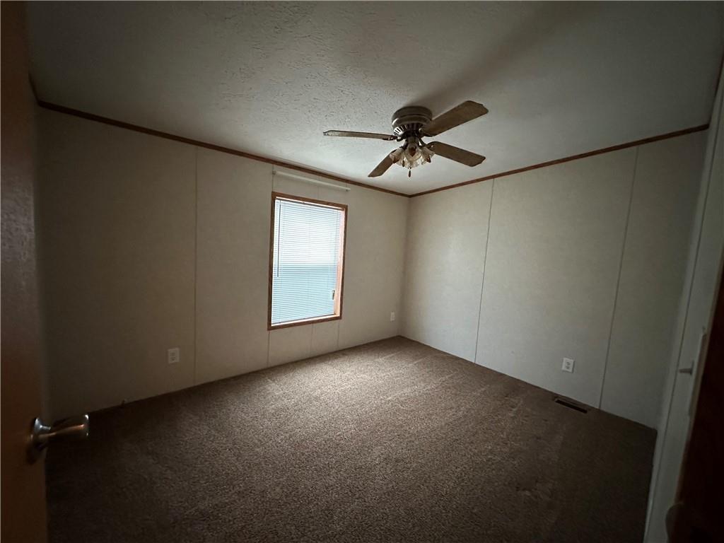 107 Trieste Street Butler, PA 16002 - Photo 30 of 40 an empty room with a empty space and windows