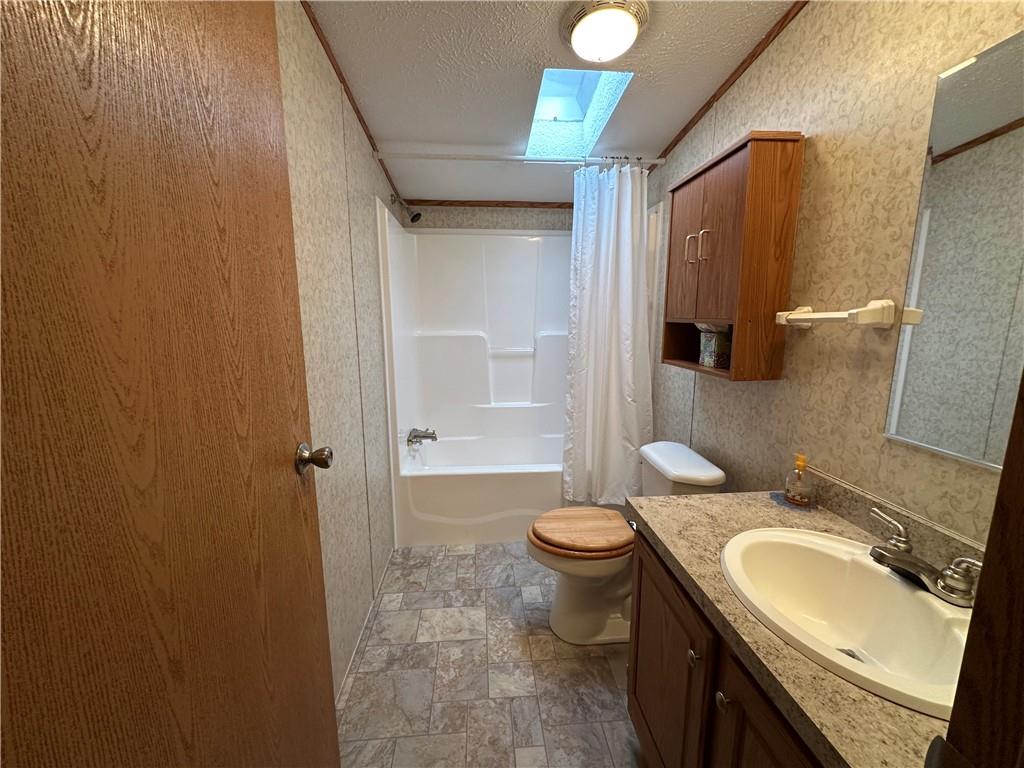 107 Trieste Street Butler, PA 16002 - Photo 35 of 40 a bathroom with a sink toilet and shower