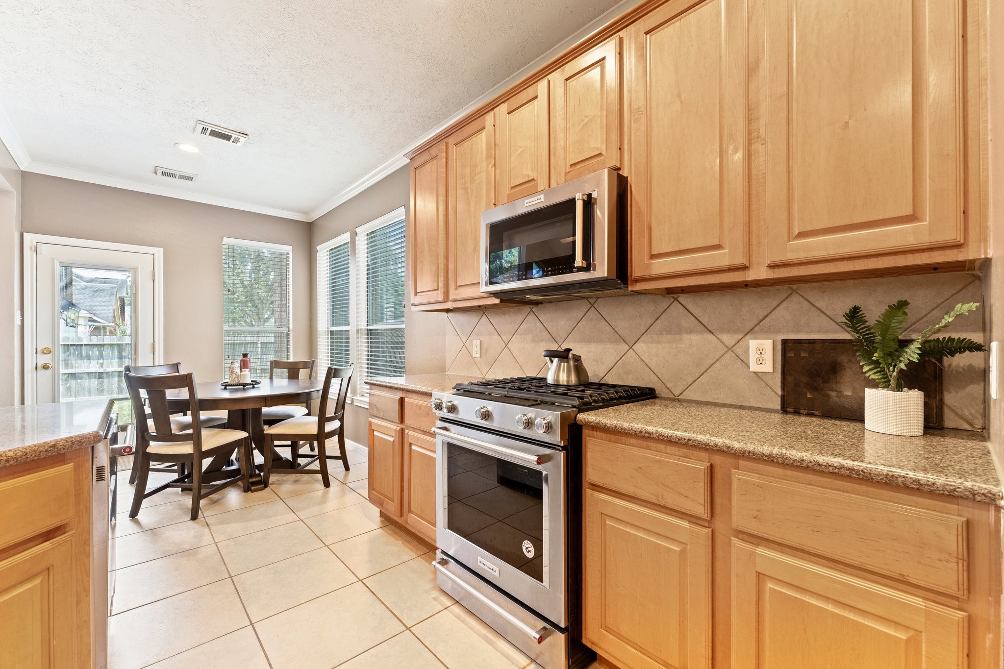 25447 China Springs Spring, TX 77373 - Photo 10 of 45 Prepare gourmet meals with your upgraded stainless steel Kitchenaid applicances.