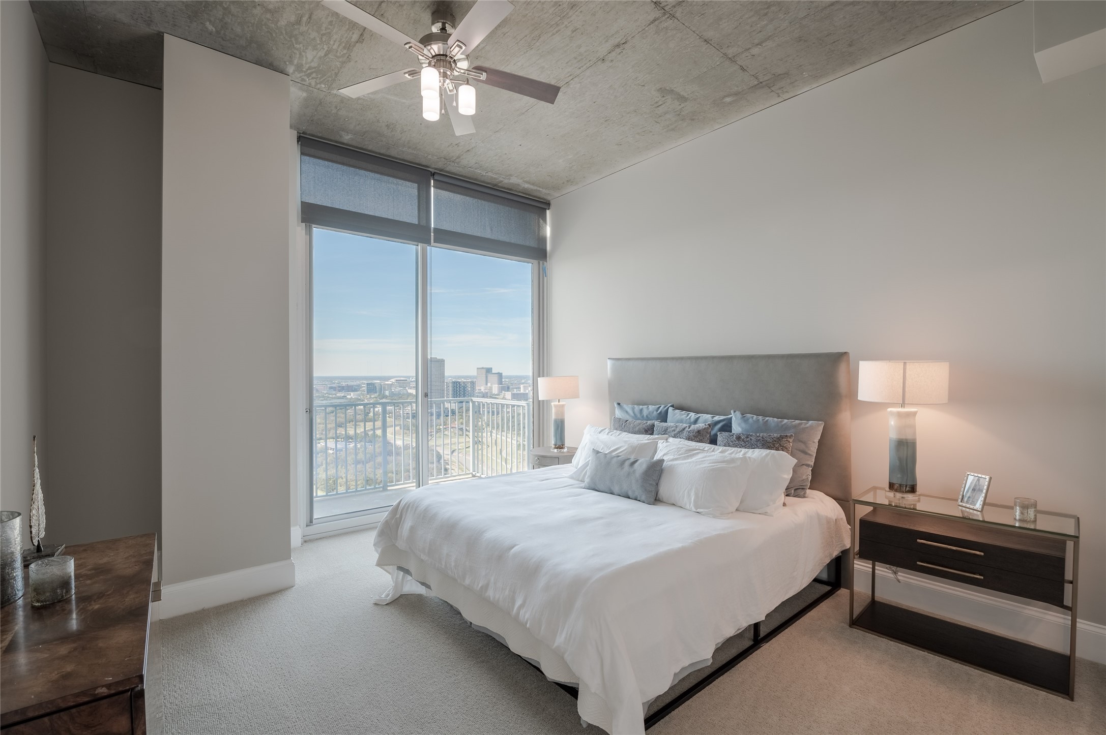 5927 Almeda Road, Unit 22905 Houston, TX 77004 - Photo 9 of 13 a bedroom with a bed and a night stand