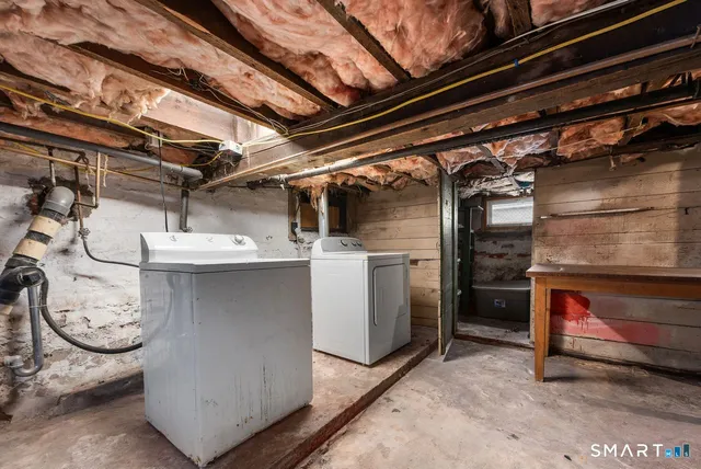 a utility room with cabinets