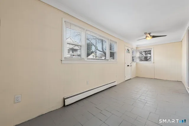 an empty room with windows