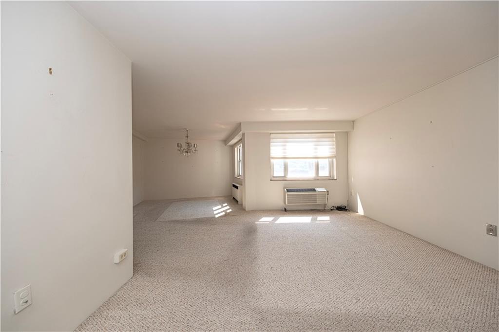 4625 Fifth Avenue, Unit 609 Pittsburgh, PA 15213 - Photo 13 of 27 an empty room with windows and closet