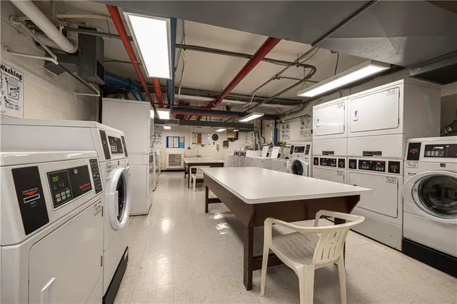 a view of a studio with sitting area