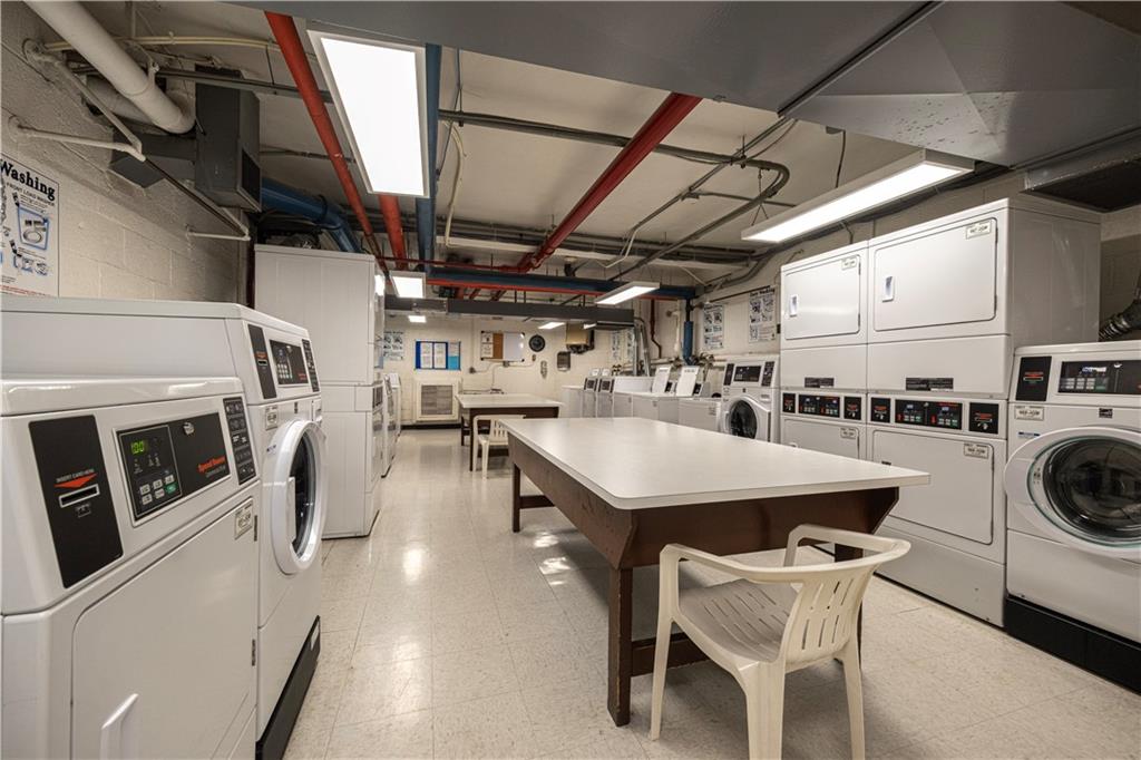 4625 Fifth Avenue, Unit 609 Pittsburgh, PA 15213 - Photo 25 of 27 a utility room with multiple dryer and washer