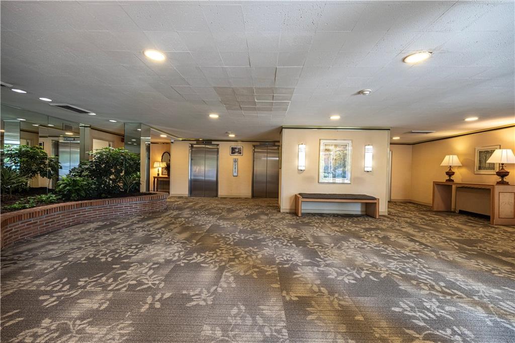 4625 Fifth Avenue, Unit 609 Pittsburgh, PA 15213 - Photo 4 of 27 a view of a livingroom with a hall and a window