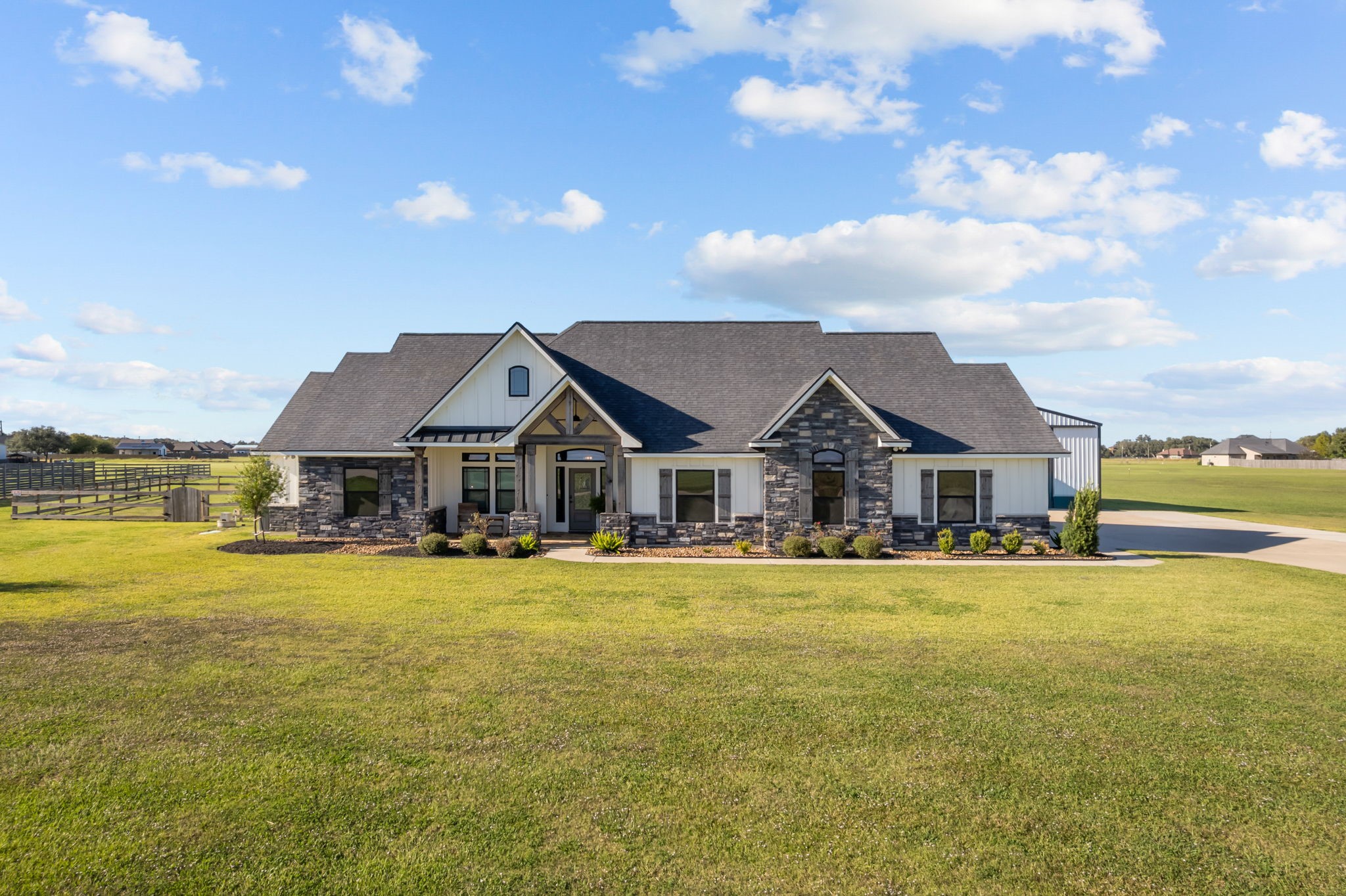 a front view of a house with swimming pool