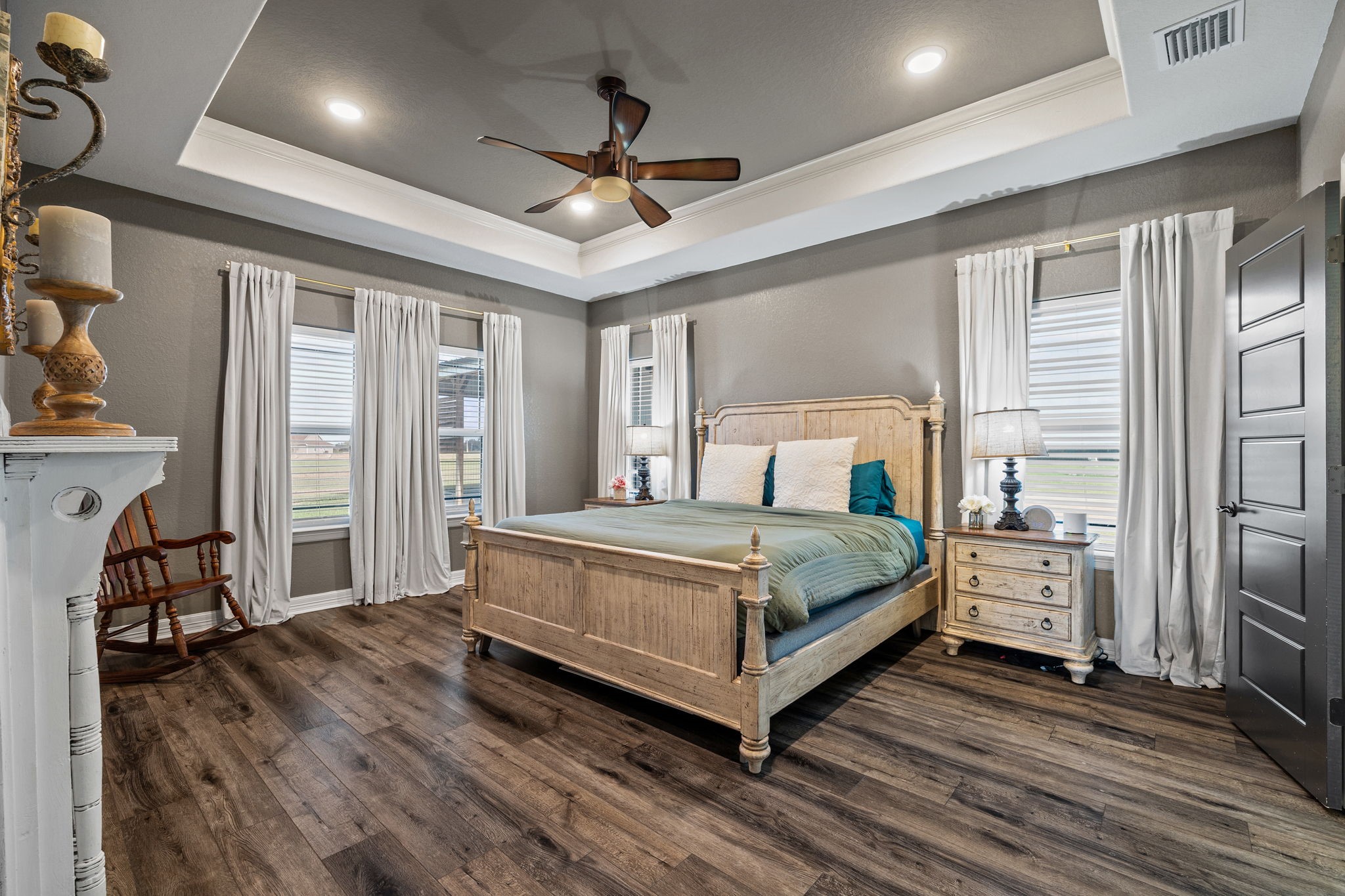 756 Angus Trail Angleton, TX 77515 - Photo 12 of 39 a bedroom with a large bed and a tv