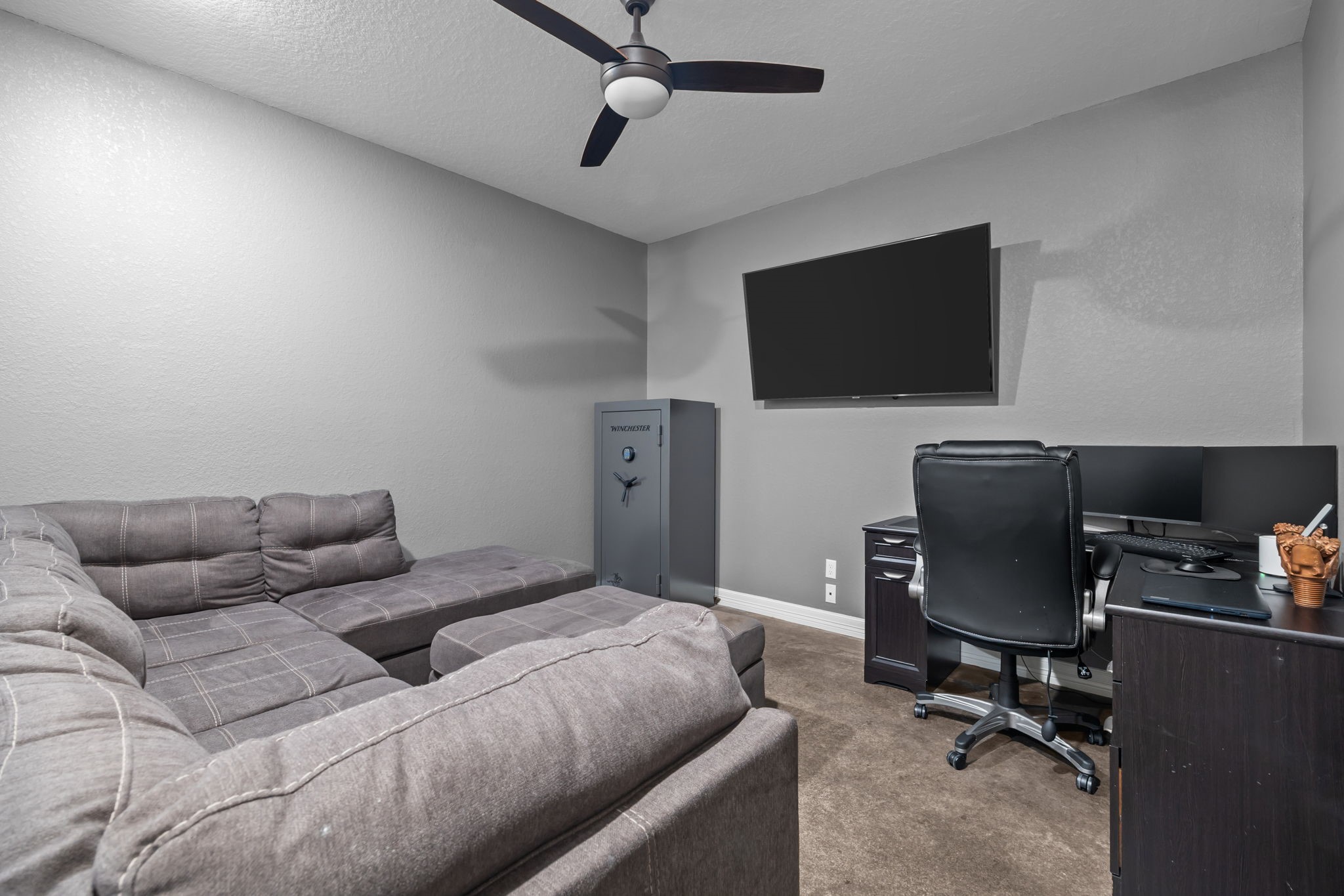 756 Angus Trail Angleton, TX 77515 - Photo 19 of 39 a bedroom with a workspace