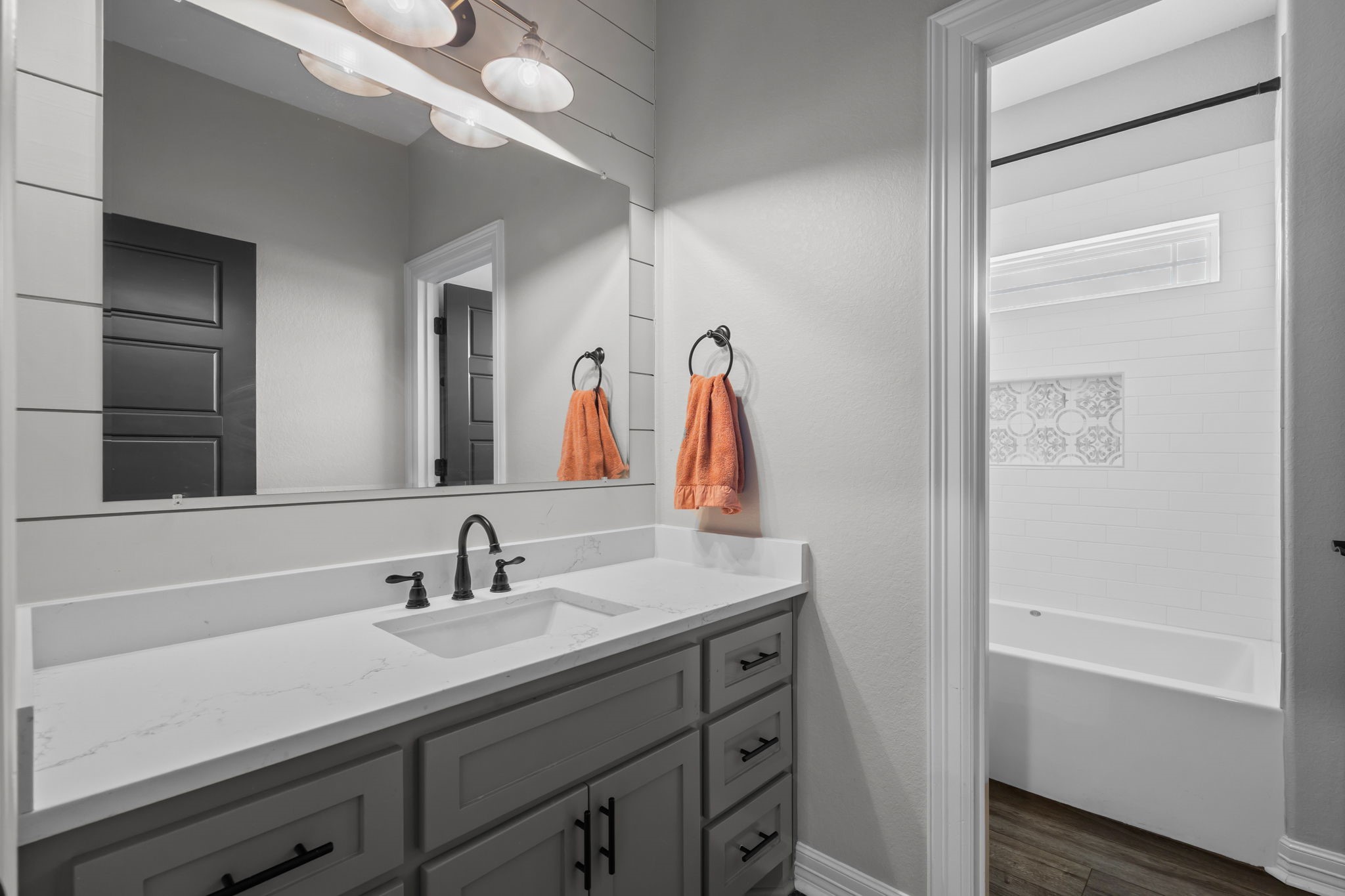 756 Angus Trail Angleton, TX 77515 - Photo 23 of 39 a bathroom with a sink and a mirror
