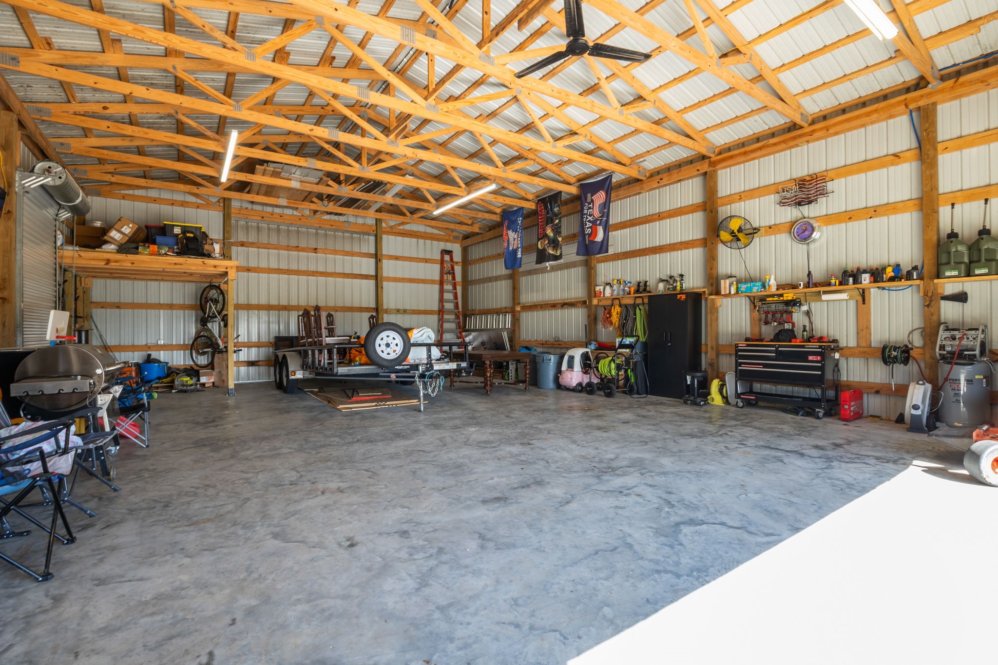 756 Angus Trail Angleton, TX 77515 - Photo 25 of 39 a view of a garage with storage