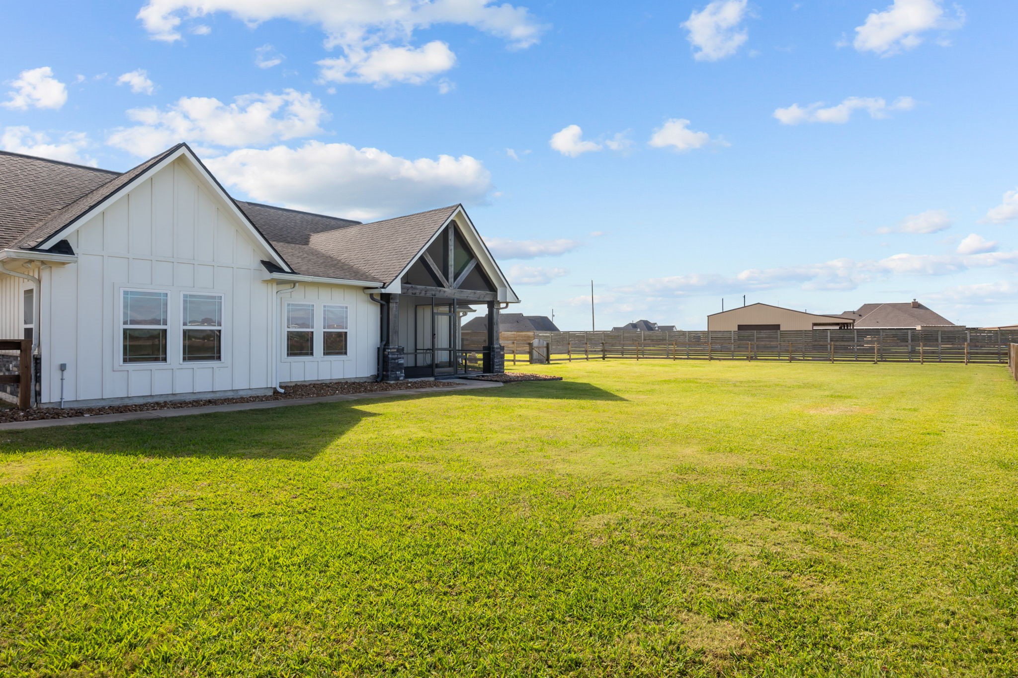 756 Angus Trail Angleton, TX 77515 - Photo 32 of 39 a view of a house with swimming pool and a yard