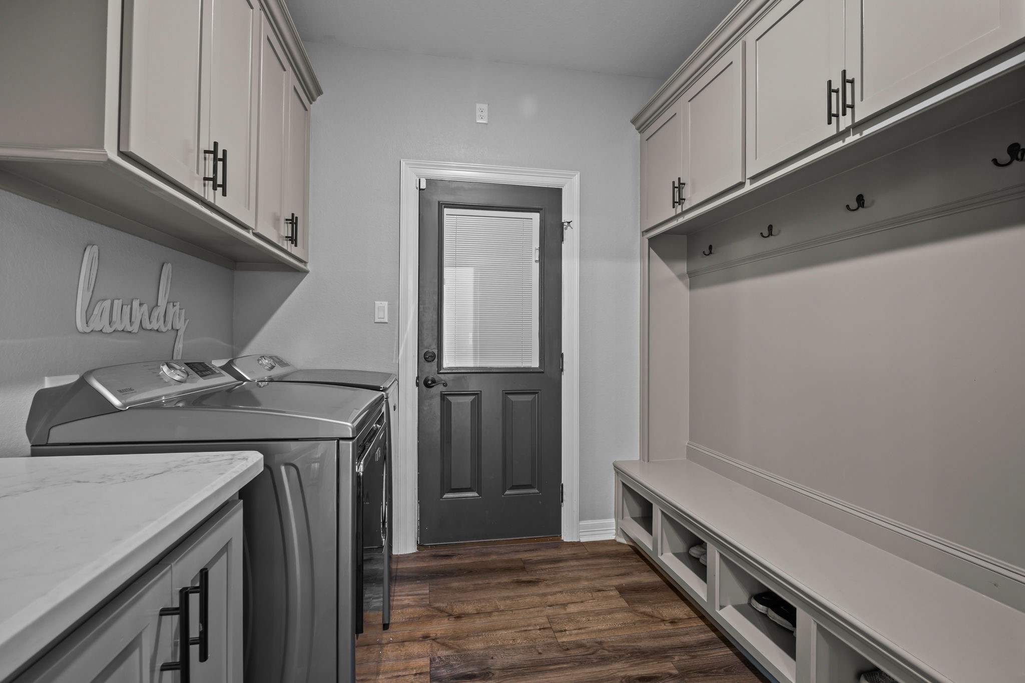 756 Angus Trail Angleton, TX 77515 - Photo 34 of 39 a kitchen with a sink and a refrigerator