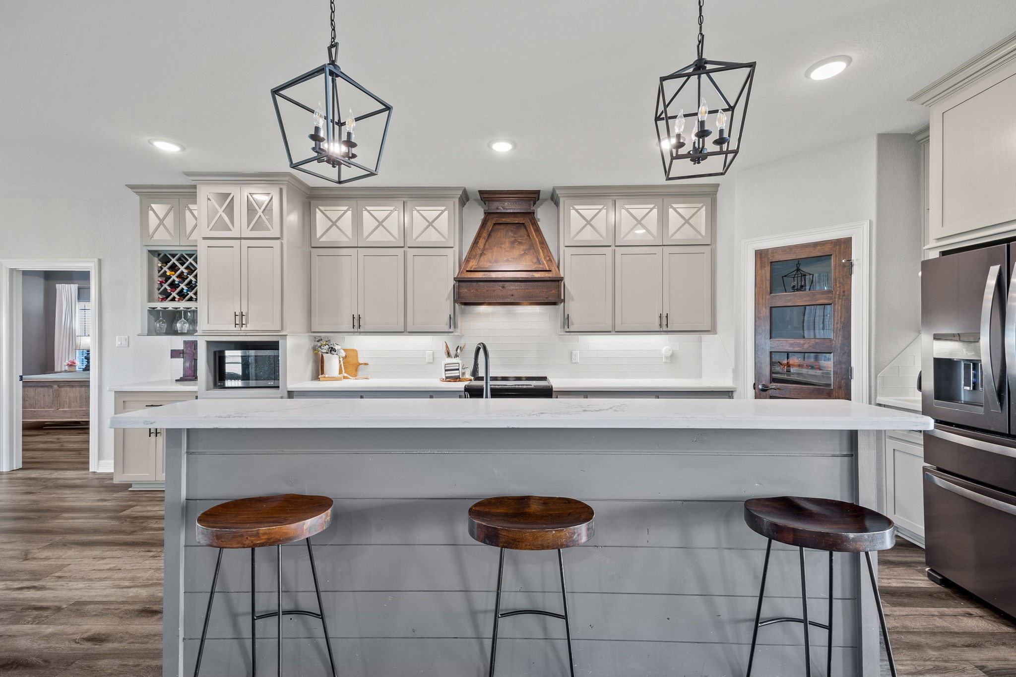 756 Angus Trail Angleton, TX 77515 - Photo 8 of 39 a kitchen with stainless steel appliances granite countertop a stove and cabinets