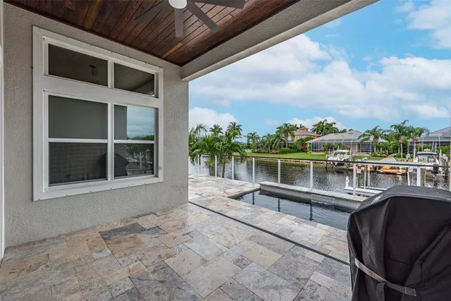 a view of swimming pool with outdoor seating
