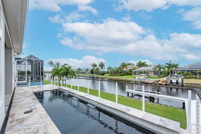 a view of a living room and a balcony
