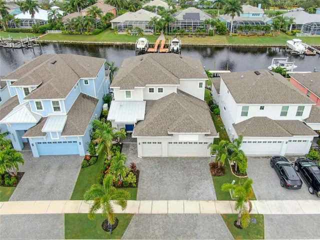 an aerial view of a house with a garden