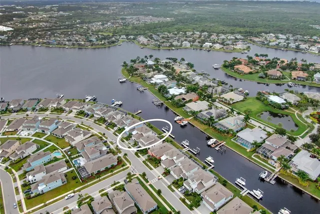an aerial view of a house with outdoor space