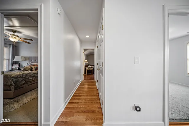 a view of an entryway with wooden floor and stairs