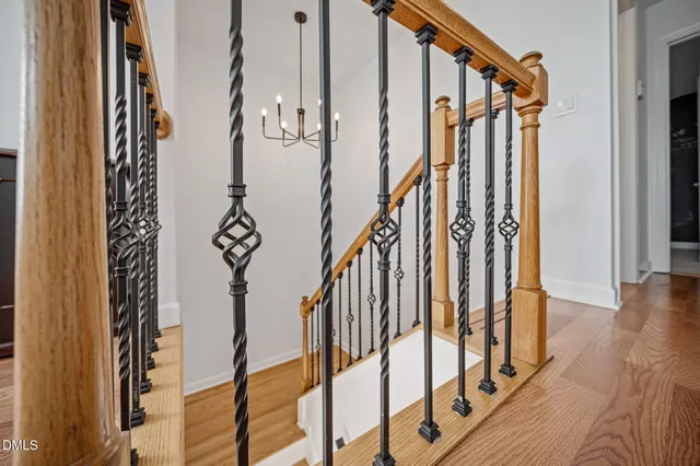 a bedroom with a large bed and a flat screen tv