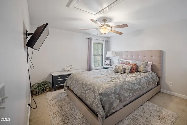 a bed room with a bed and a window