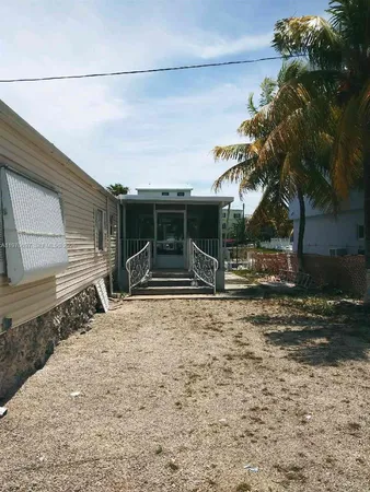 $990,000 | 261 Burgundy Drive, Tavernier, FL 33070