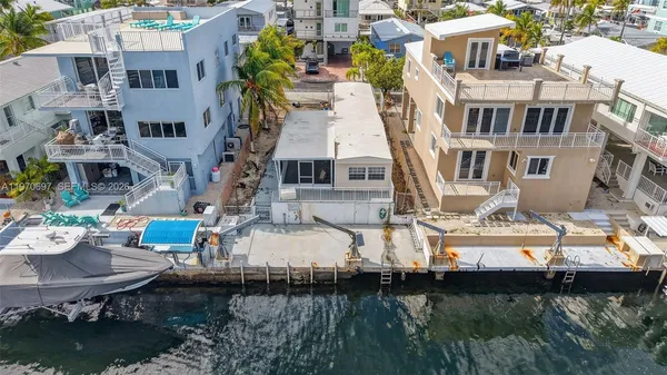 $990,000 | 261 Burgundy Drive, Tavernier, FL 33070