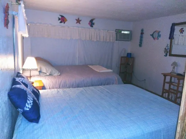 $990,000 | 261 Burgundy Drive, Tavernier, FL 33070