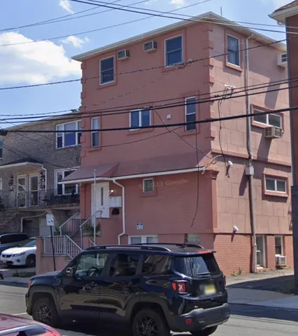a car parked in front of a building