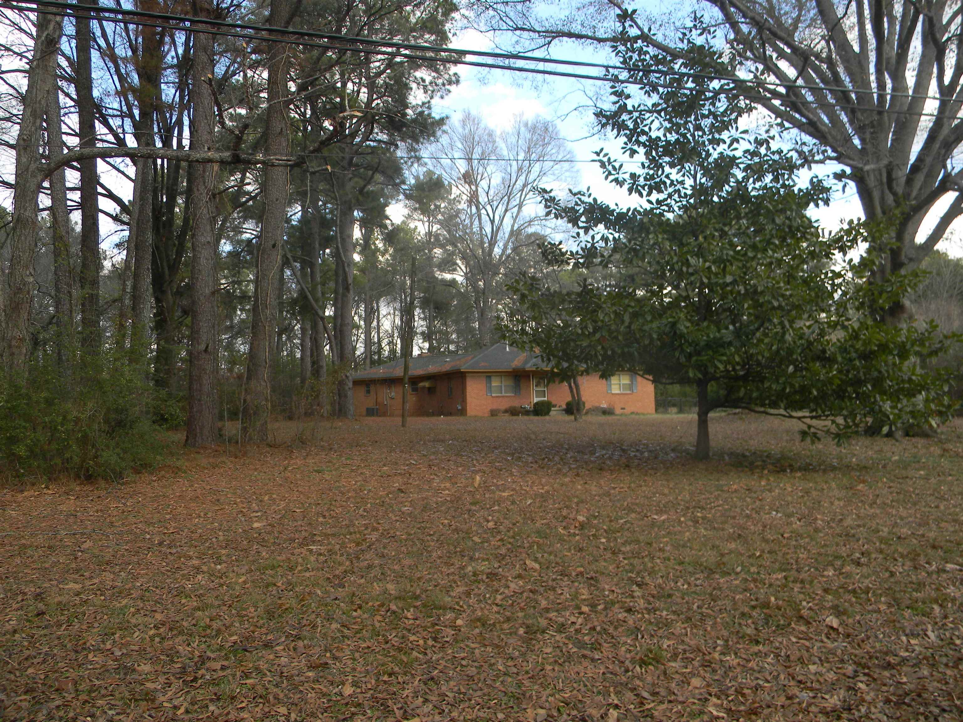 5558 Crestview Road Memphis, TN 38134 - Photo 2 of 32 a view of a house with a tree