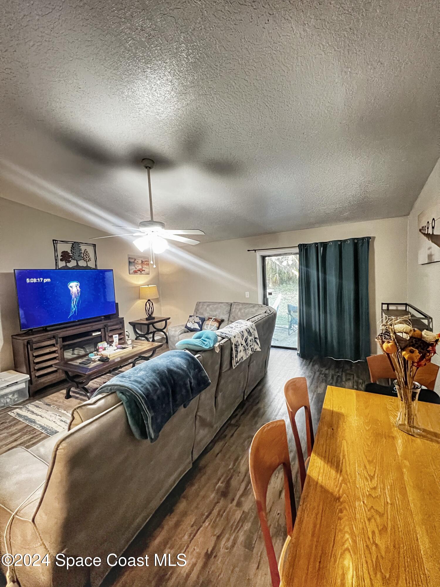 5915 Sisson Road Titusville, FL 32780 - Photo 4 of 23 Left - famliy room