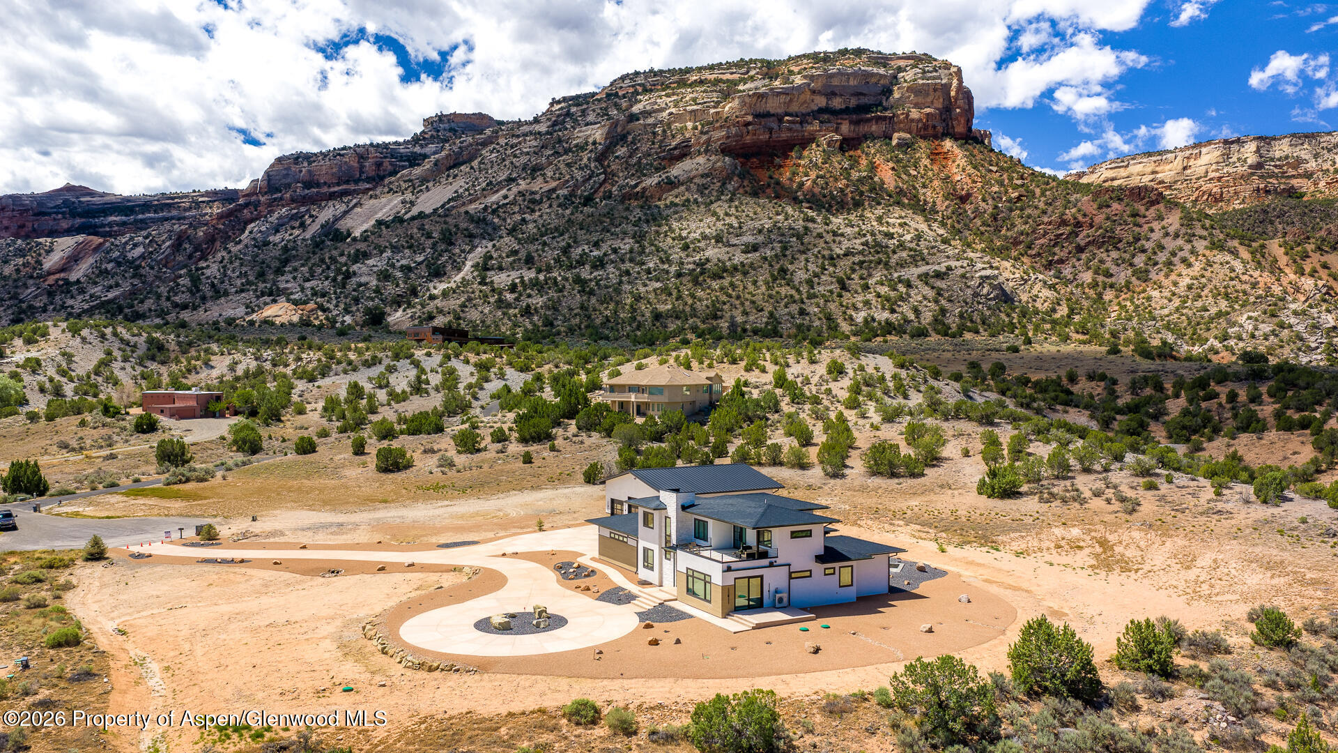 2216 Rimrock Road Grand Junction, CO 81507 - Photo 82 of 84 a view of swimming pool with a yard and mountain view