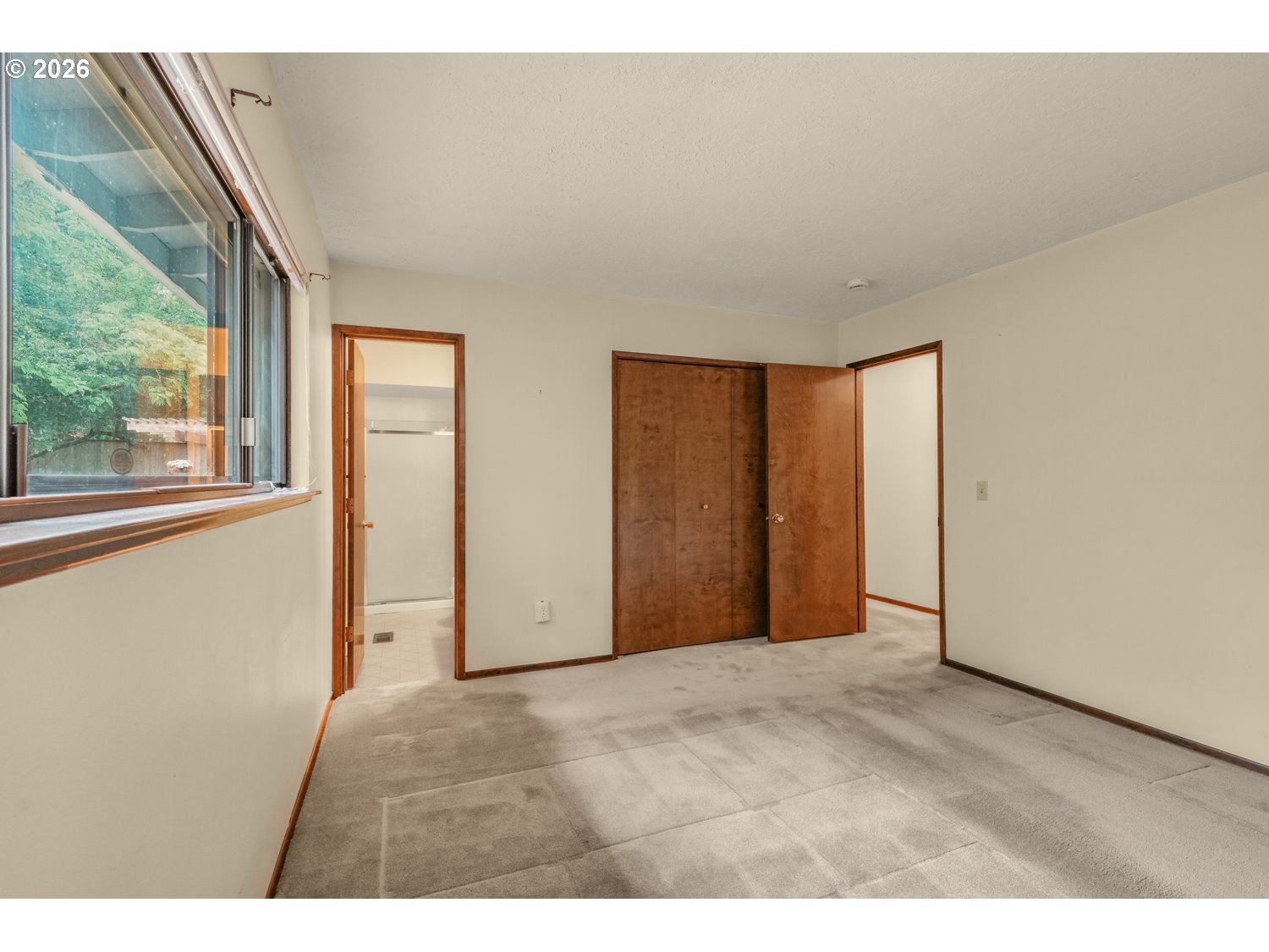 14155 Southwest 27th Street Beaverton, OR 97008 - Photo 19 of 27 a view of an empty room with a window