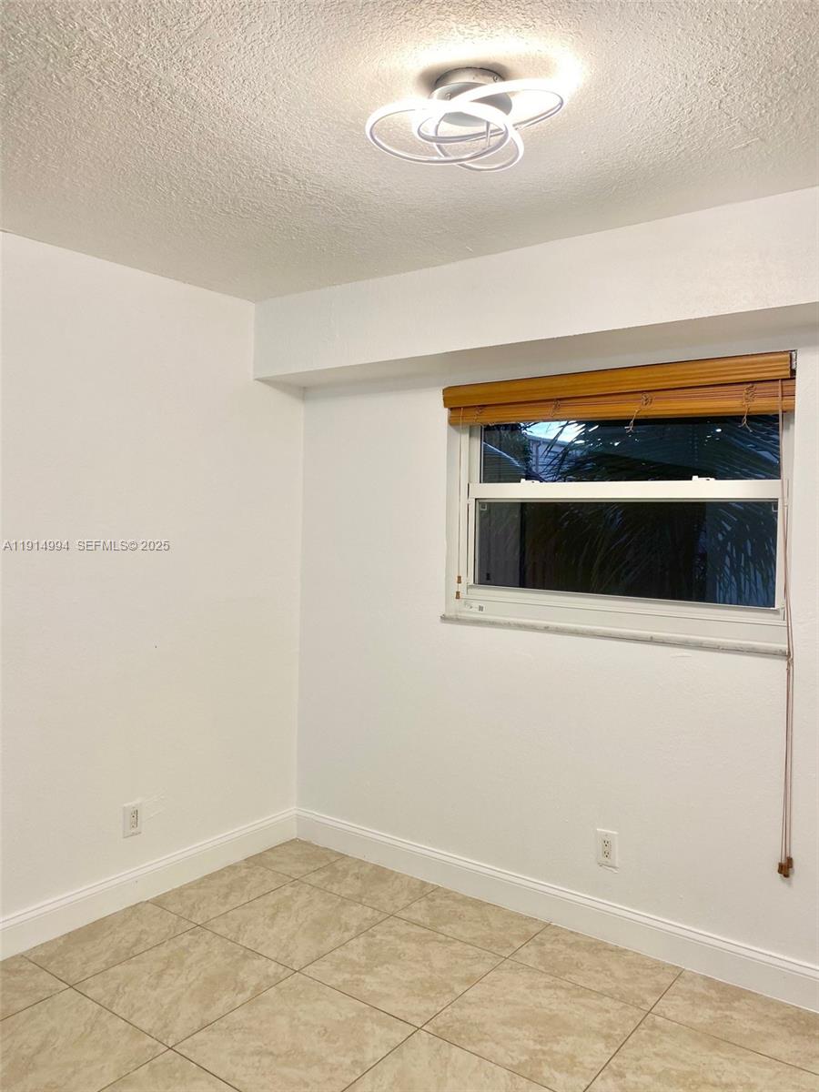 6568 Southwest 41st Place, Unit 151 Davie, FL 33314 - Photo 22 of 65 a view of an empty room