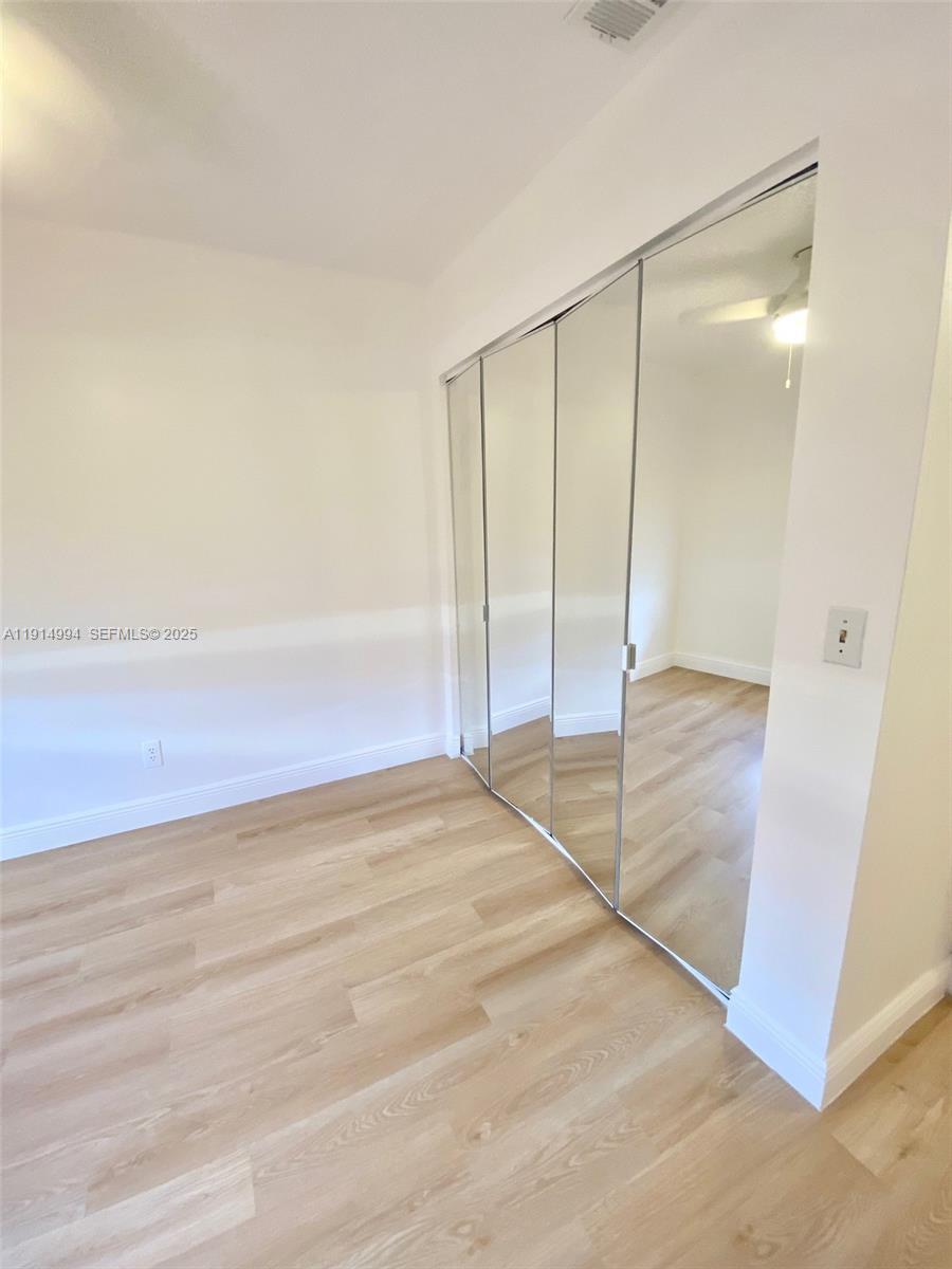 6568 Southwest 41st Place, Unit 151 Davie, FL 33314 - Photo 45 of 65 a view of an empty room